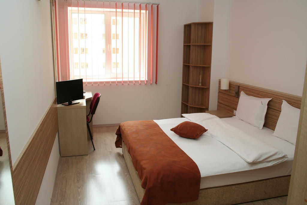 Top Rooms Aparthotel Бухарест Номер фото
