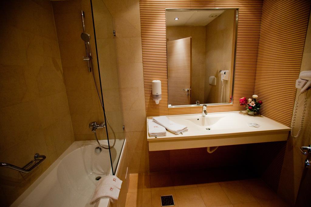 Top Rooms Aparthotel Бухарест Номер фото