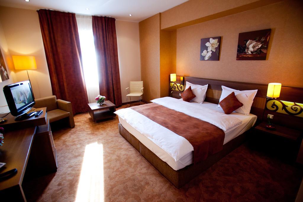 Top Rooms Aparthotel Бухарест Номер фото